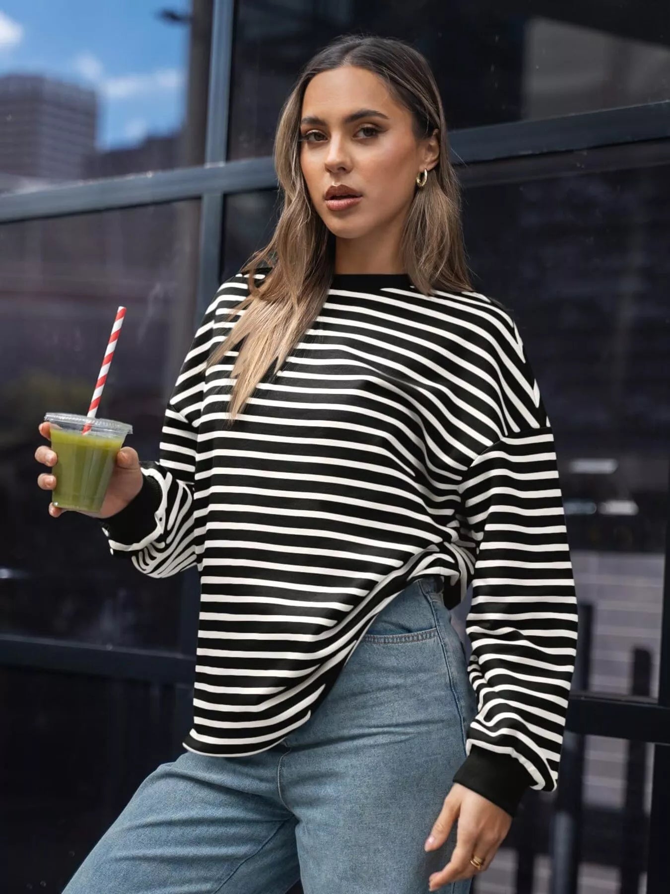 Oversized striped sweatshirt in a rayon blend with slightly stretchy fabric.