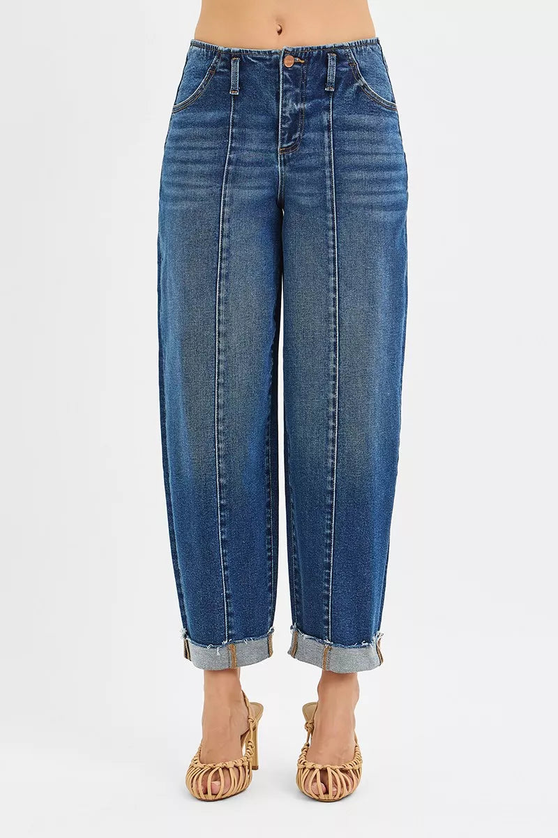 High-rise barrel cuffed jeans in stretch denim with raw hem and contrast stitching.
