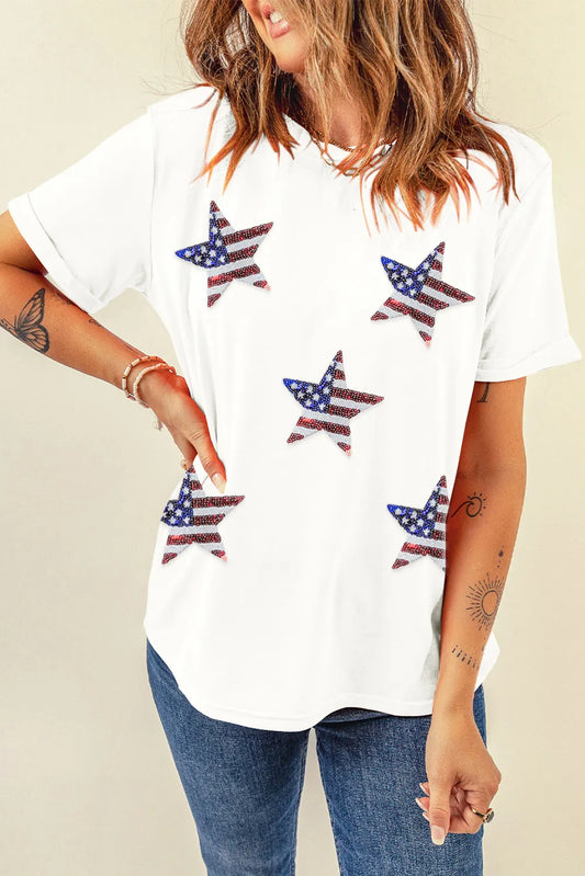 Sheer round neck t-shirt with sequin stars and short sleeves in a stretchy fabric.