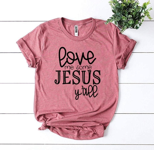 Pink Bella Canvas cotton t-shirt with "Love Me Some Jesus Y'all" text design.