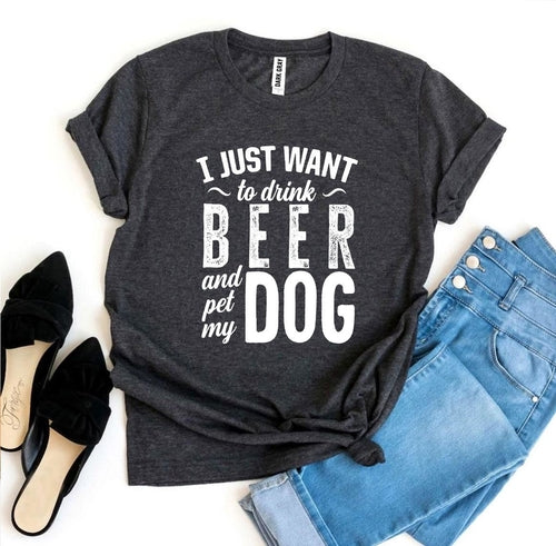 Gray Bella Canvas t-shirt with "I Just Want To Drink Beer & Pet My Dog" text, worn with jeans and heels.
