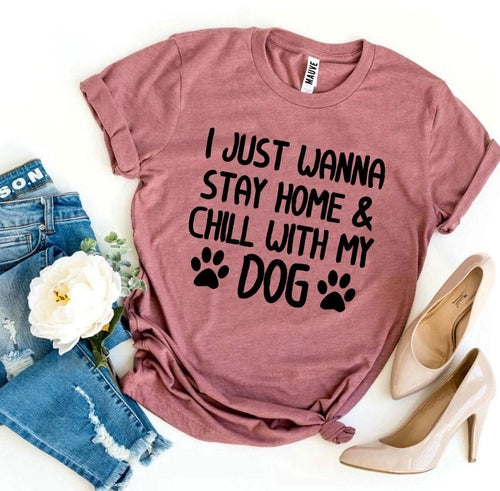 Pink soft cotton t-shirt with "I just wanna stay home & chill with my dog" graphic and paw prints.