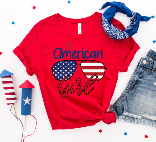 Red T-shirt with "All American Girl" text and American flag sunglasses graphic.