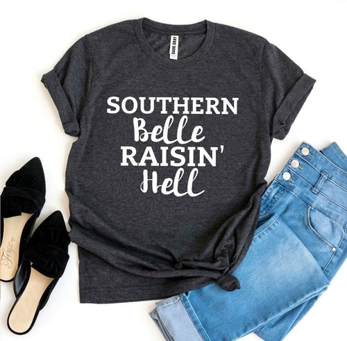 Gray Bella Canvas T-shirt with "Southern Belle Raisin' Hell" text, styled with jeans and black heels.