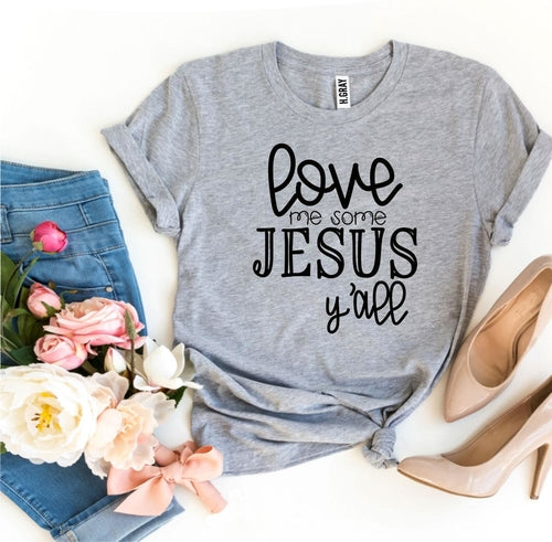 Gray Bella Canvas cotton t-shirt with "Love Me Some Jesus Y'all" text, styled with jeans and heels.