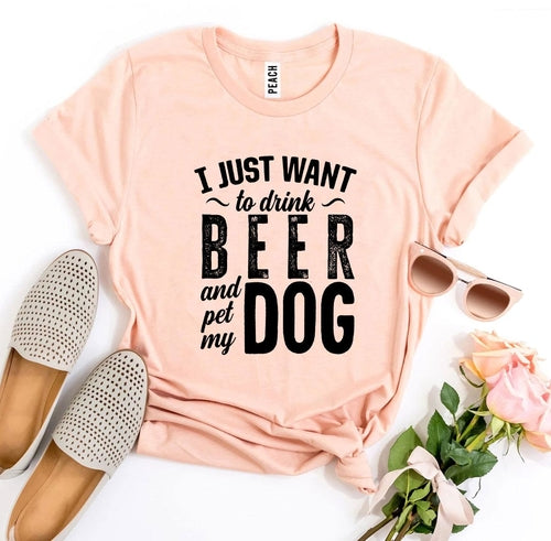 Pink Bella Canvas t-shirt with "I Just Want To Drink Beer & Pet My Dog" text.