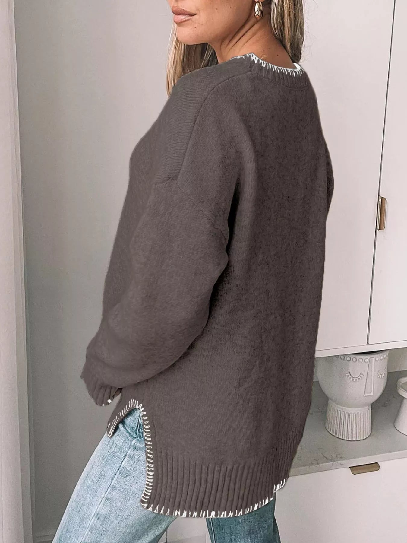 Lightweight round neck sweater with contrast trim and slight stretch in a viscose blend.