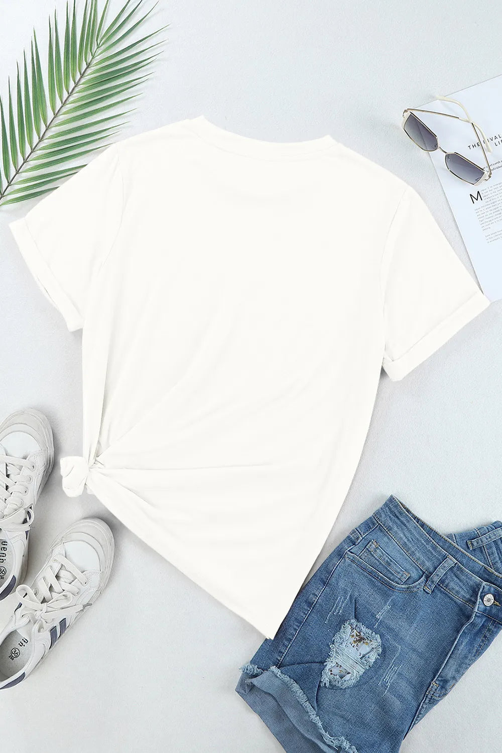 Sheer round neck t-shirt with short sleeves and sequin star design in a stretch fabric.