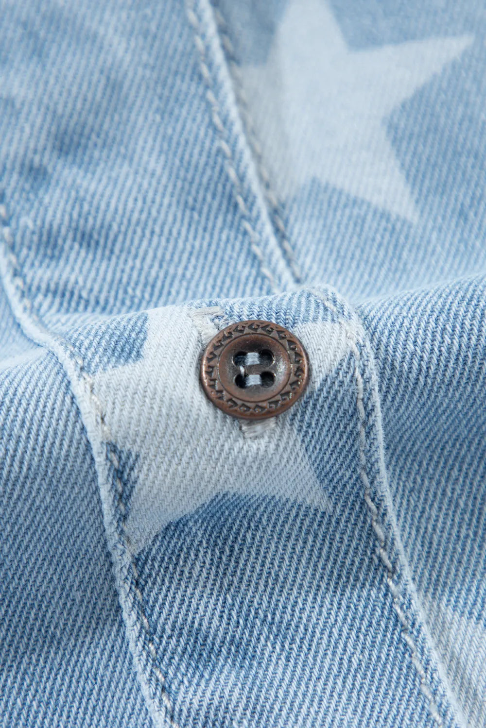 Raw hem denim top with a star collar in a cotton blend fabric.
