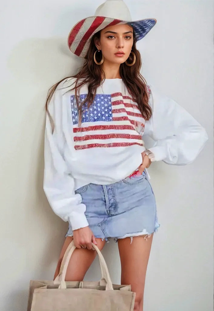 Long sleeve sweatshirt with US flag design, round neck, and slightly stretchy cotton blend.