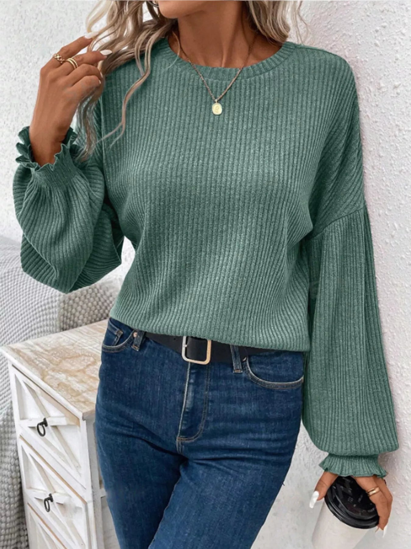 Ribbed knit long sleeve t-shirt in stretchy polyester blend with fitted silhouette