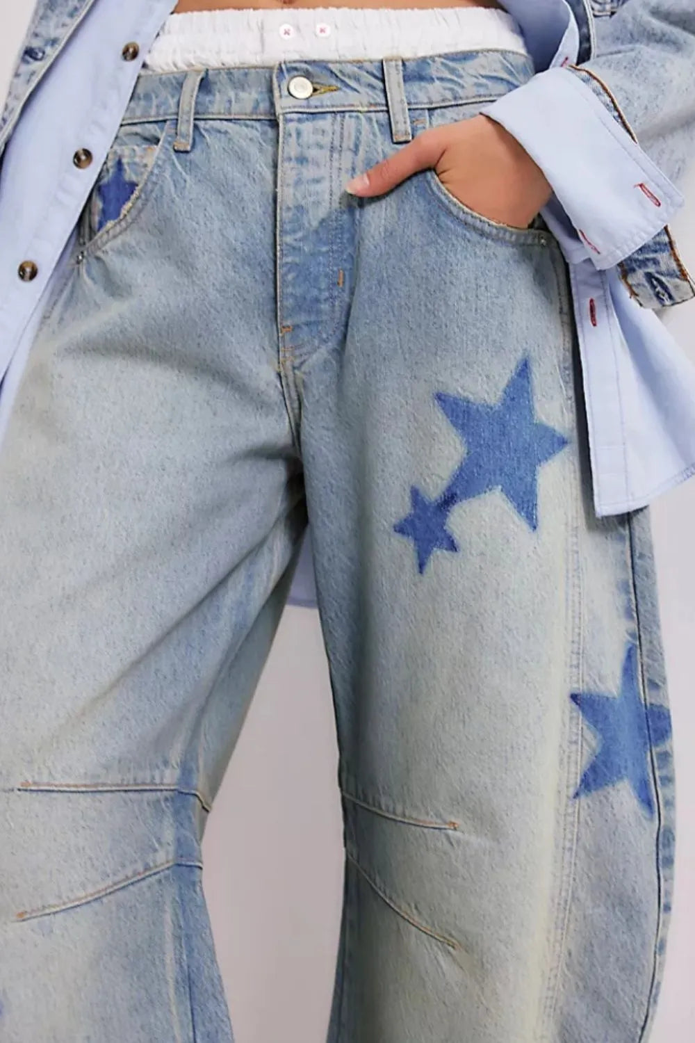 Wide leg jeans in dark denim with contrast star detail and no stretch rayon blend fabric