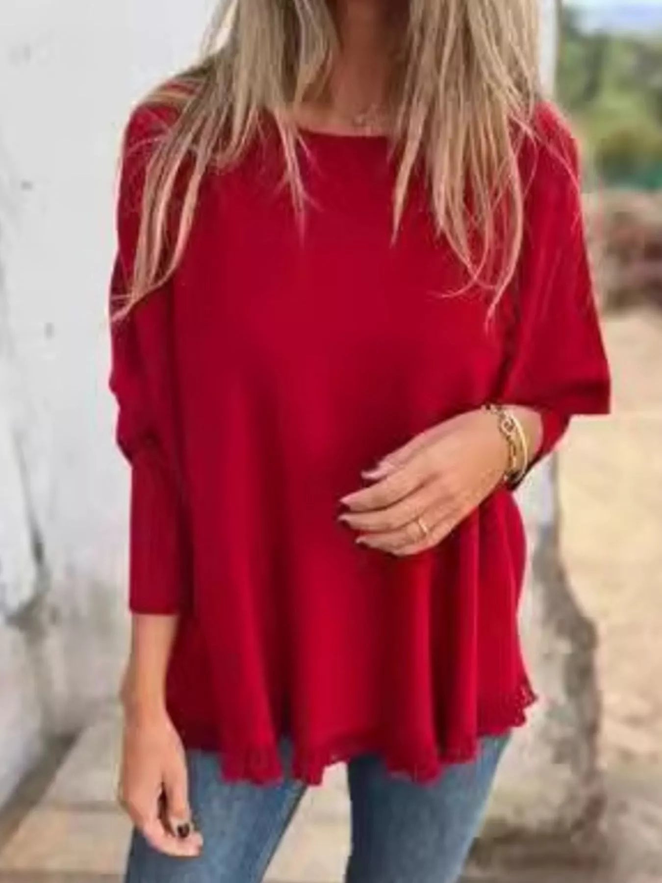 Plus size round neck long sleeve knit top with lace trim in soft polyester fabric.