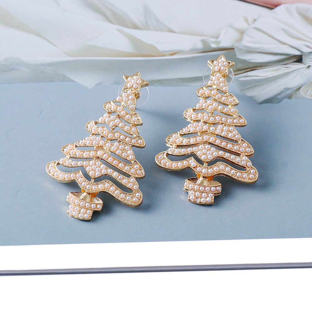 Pair of gold alloy Christmas tree earrings adorned with rhinestones and white beads.