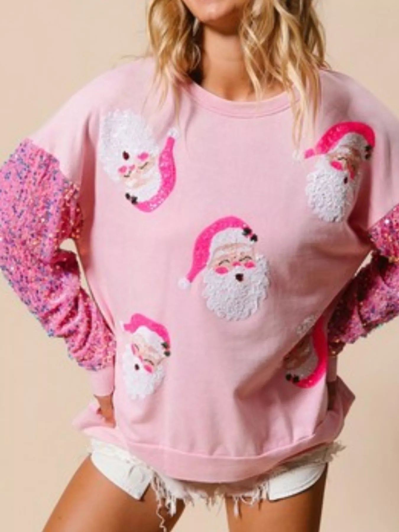 Long sleeve sweatshirt with subtle sequins and a comfortable, slightly stretchy fit.