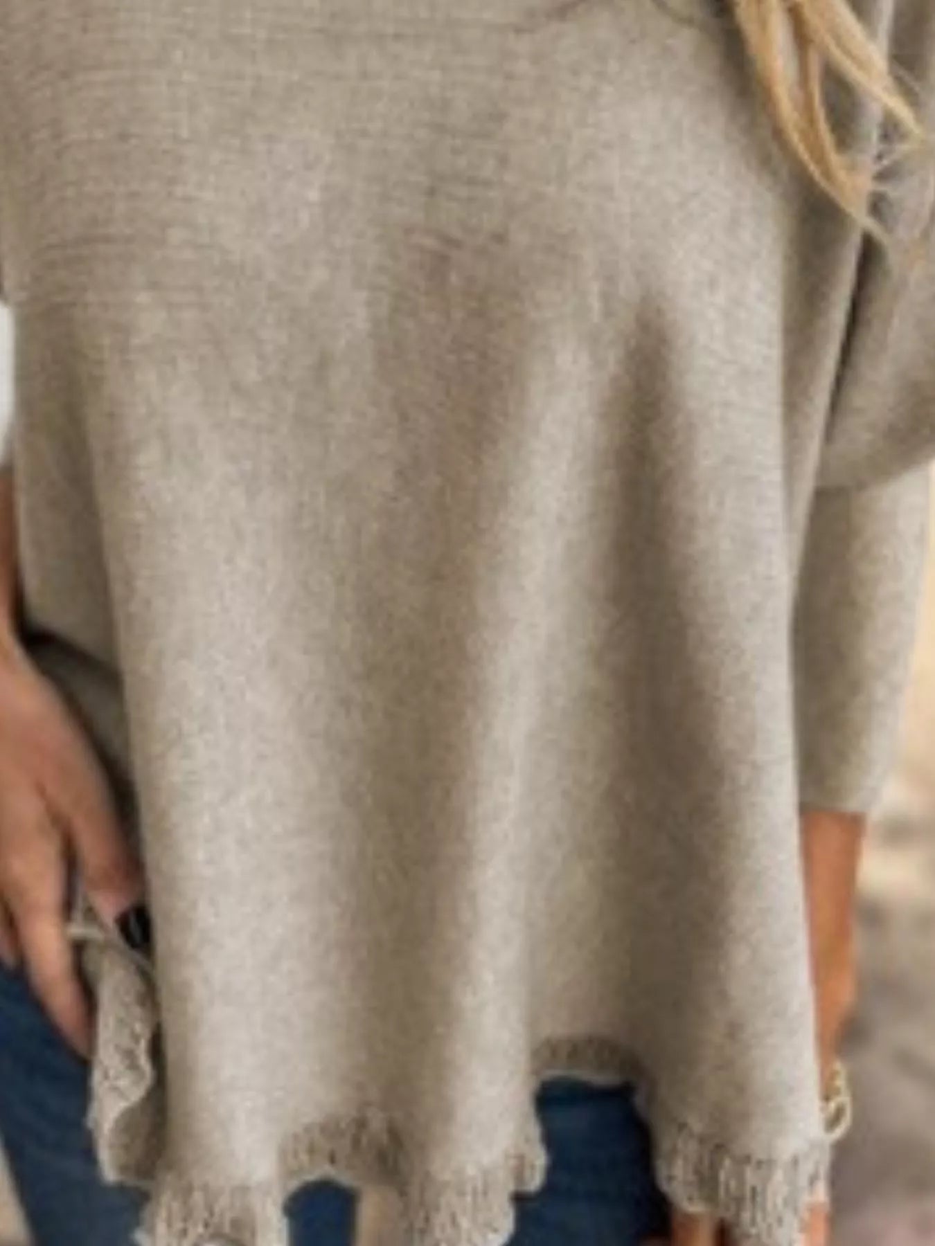 Plus size round neck long sleeve knit top with lace trim in soft polyester fabric.