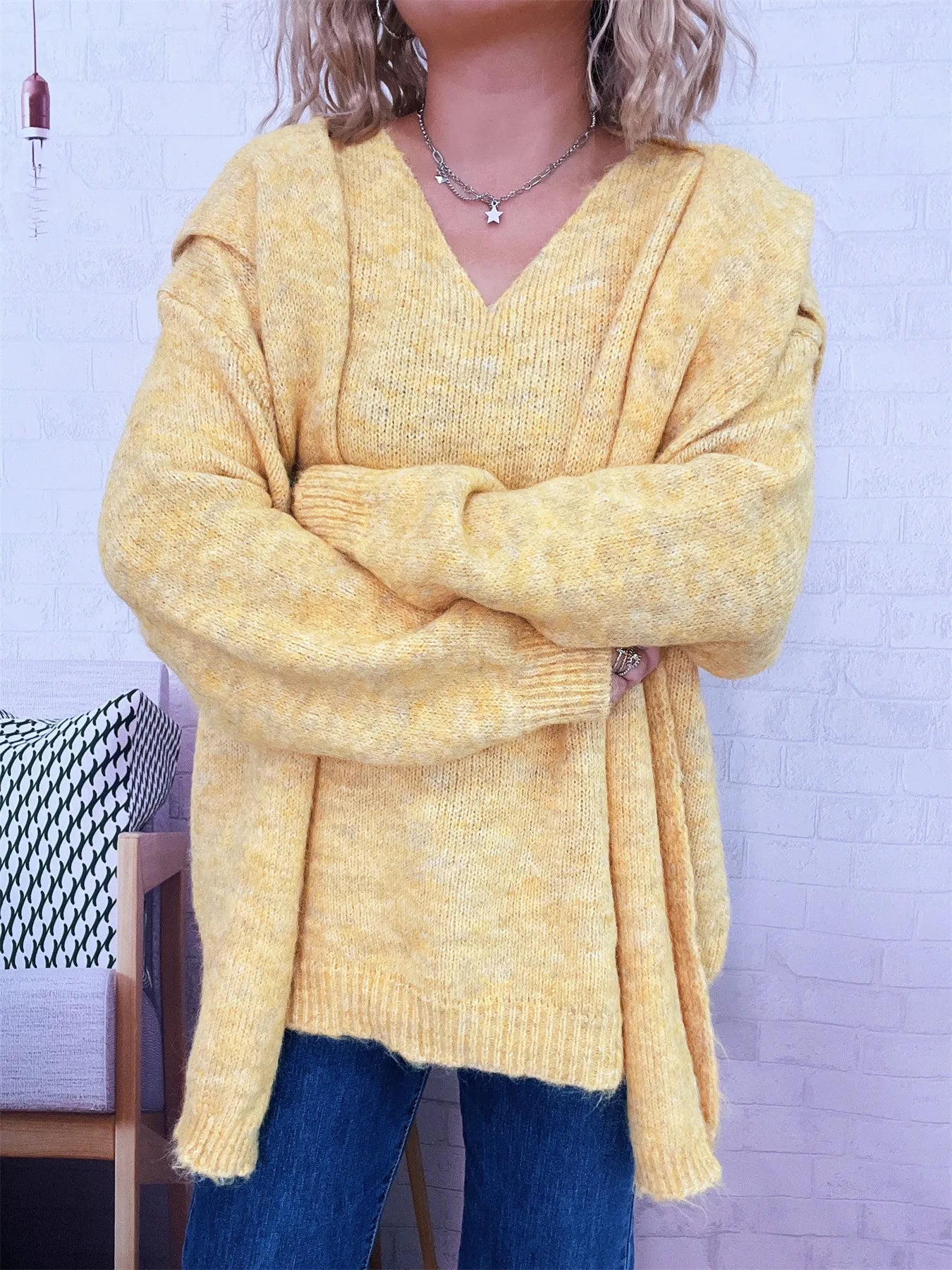 Ribbed hem V-neck sweater with shawl collar in black polyester fabric