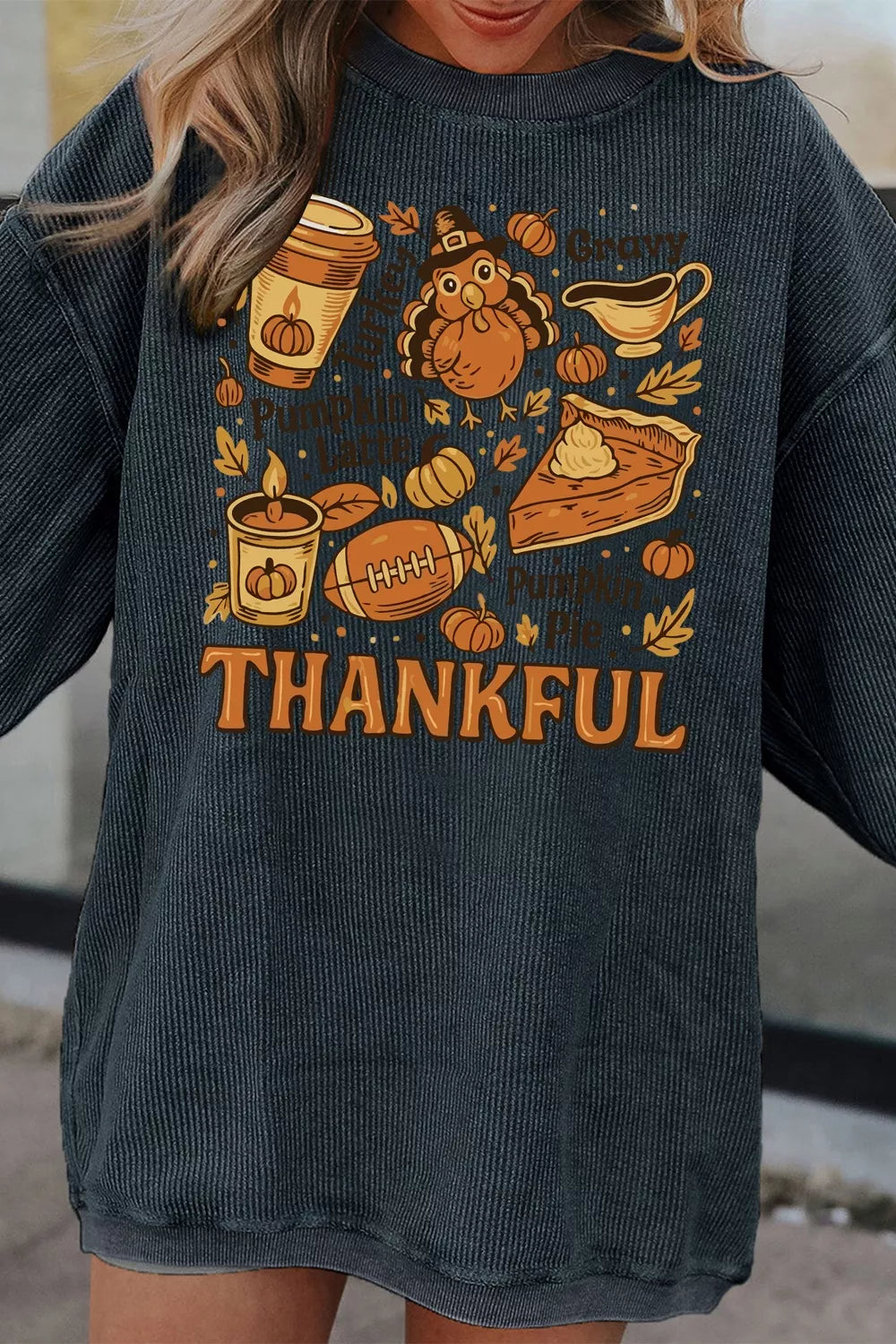 Lightweight long sleeve sweatshirt with a Thanksgiving graphic and slightly stretchy fabric.