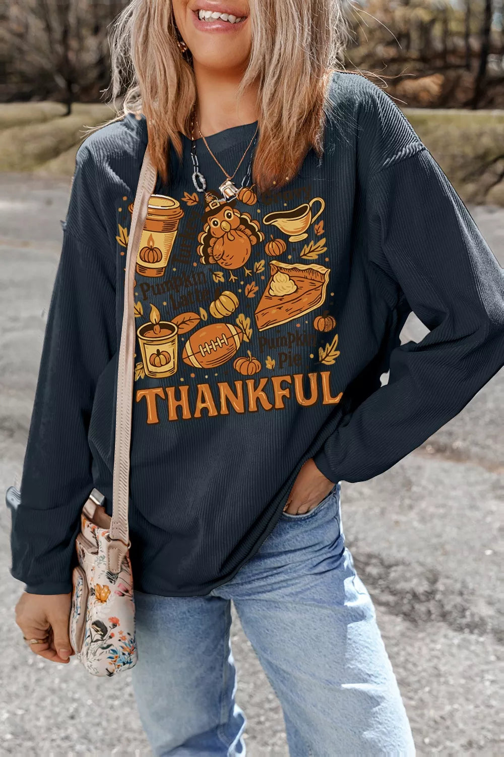 Long sleeve sweatshirt with Thankful Thanksgiving graphic in basic style and slight stretch