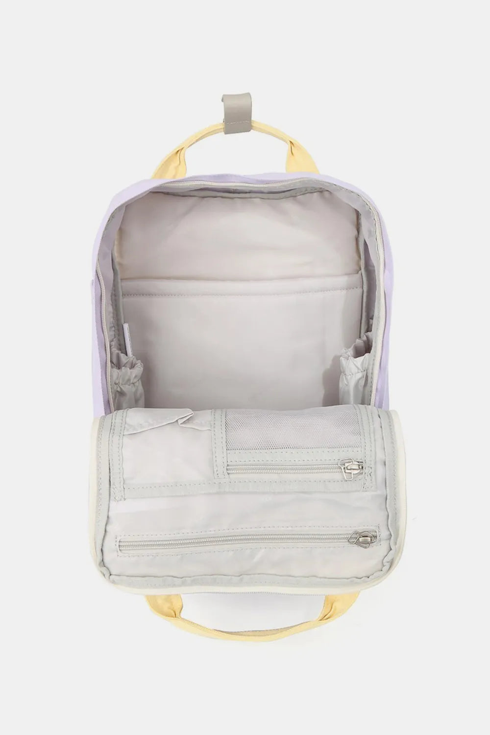 Open Himawari water-resistant nylon backpack in lavender with yellow straps and interior pockets.