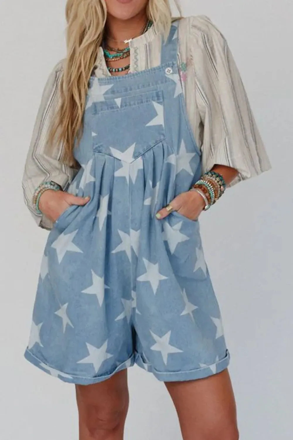 Denim overalls with star print and square neck in a cotton blend fabric.