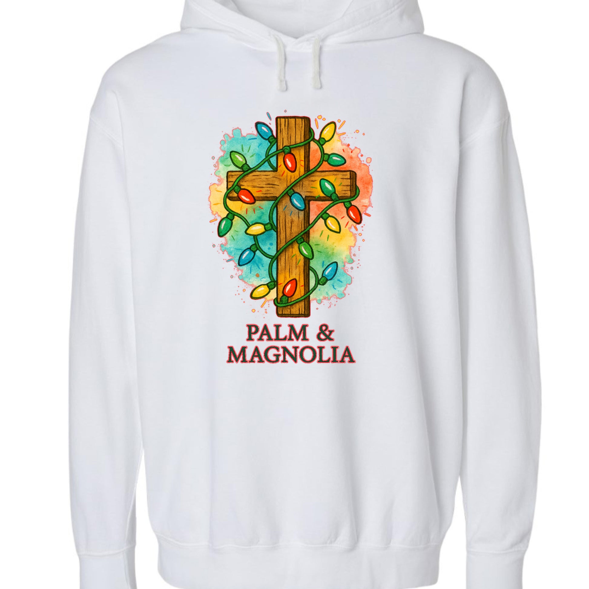 White hoodie with rustic wooden cross wrapped in colorful Christmas lights and "Palm & Magnolia" text.