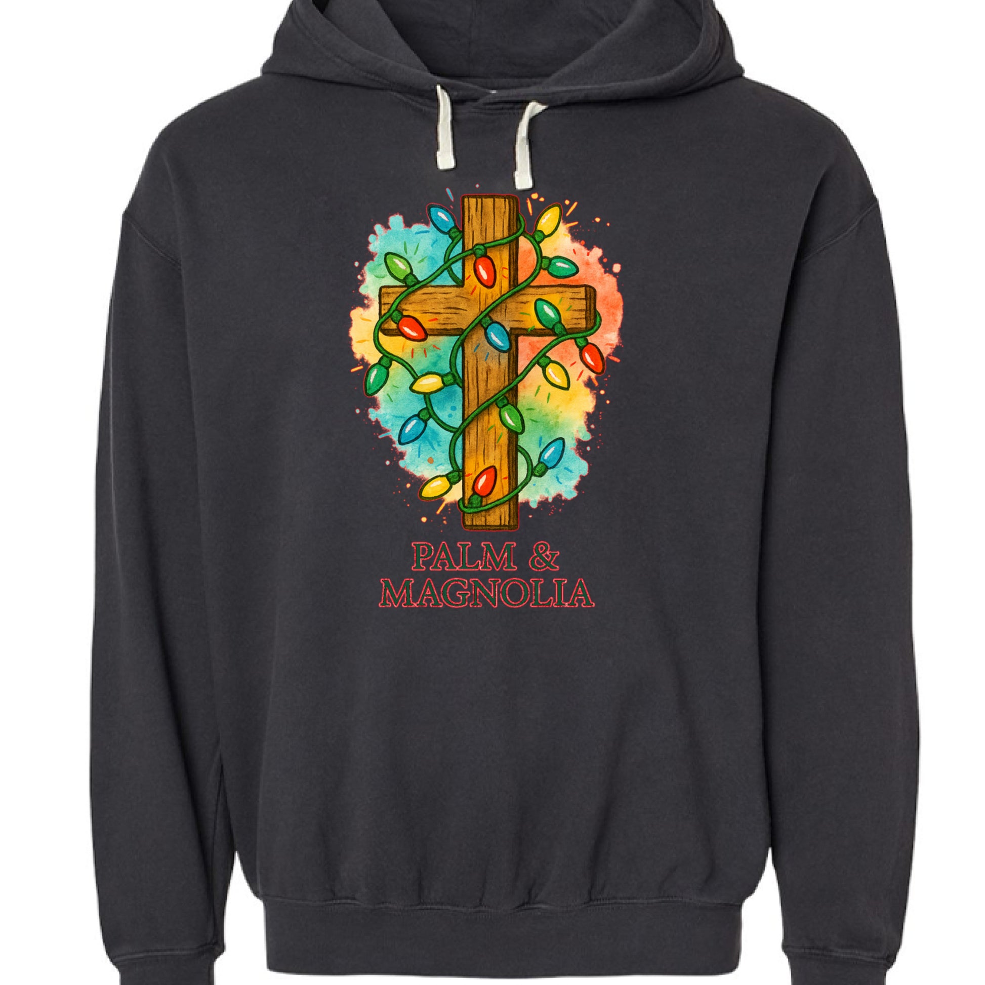 Black hoodie with rustic wooden cross wrapped in colorful Christmas lights and Palm & Magnolia text.