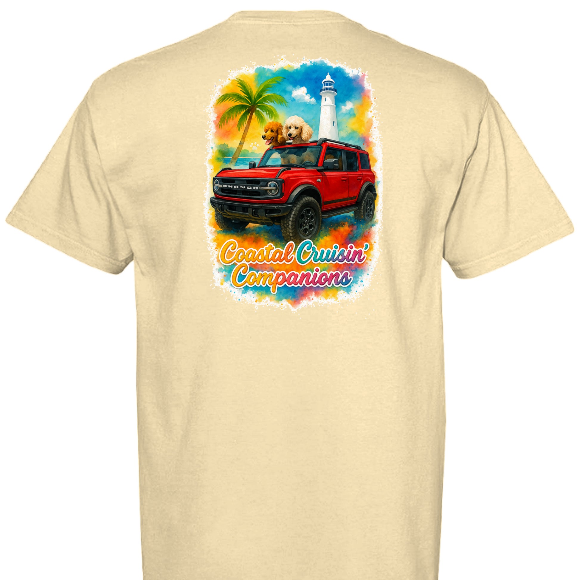 Back view of beige Comfort Colors T-shirt with colorful print of red Bronco, golden retriever, palm tree, lighthouse, and "Coastal Cruisin' Companions" text.