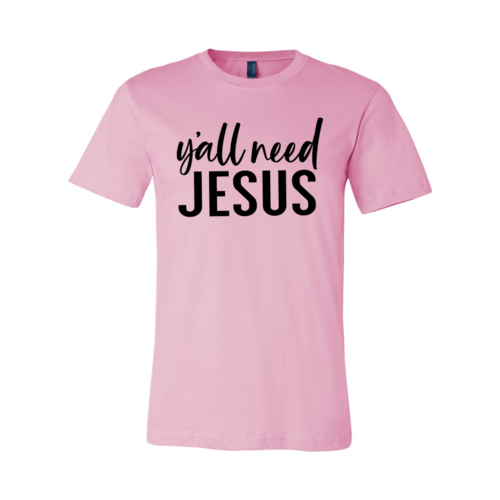 Pink unisex Bella Canvas T-shirt with "Y'all Need Jesus" text in black script.