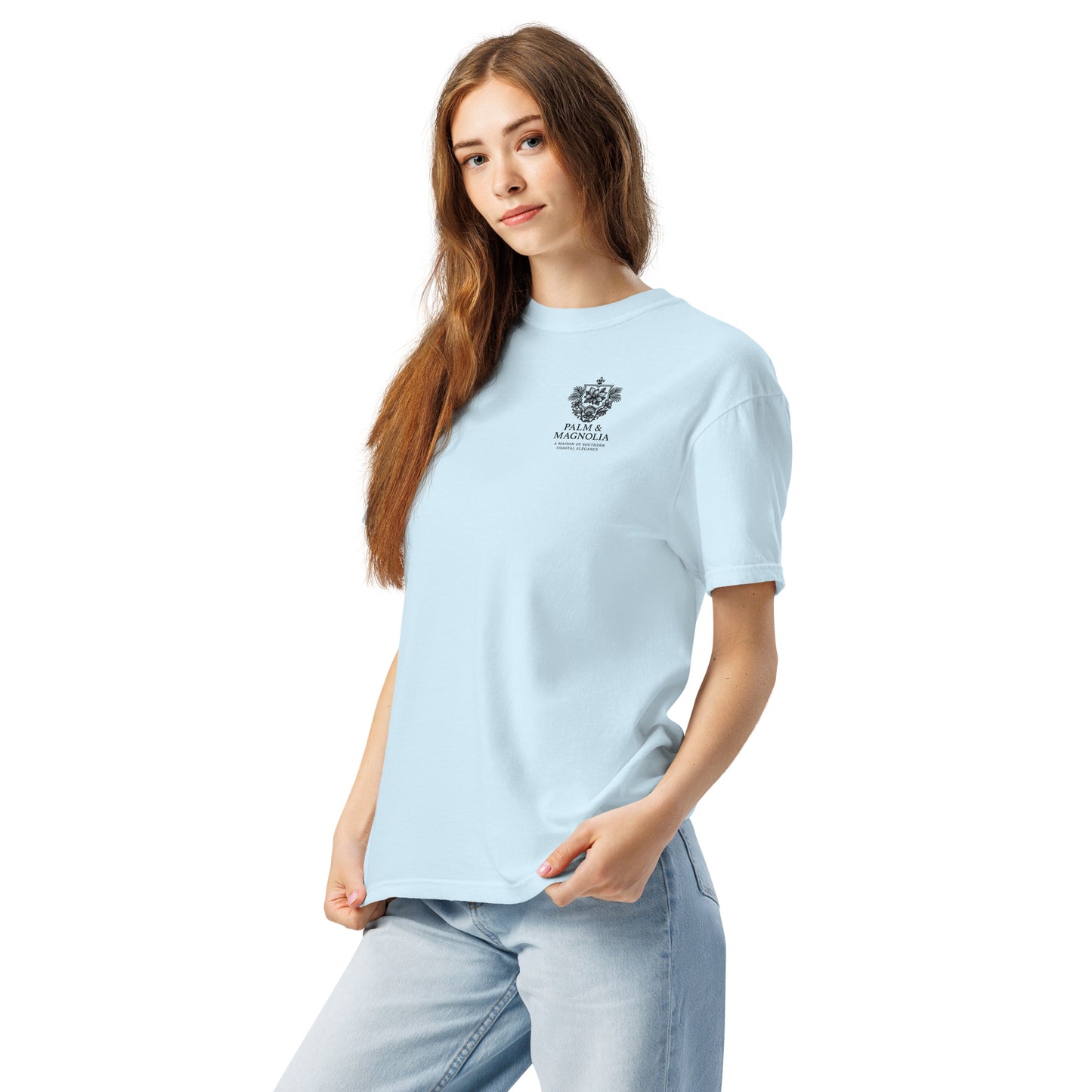 A woman models a light blue Comfort Colors short-sleeve tee with a Hard Rock Bronco graphic.