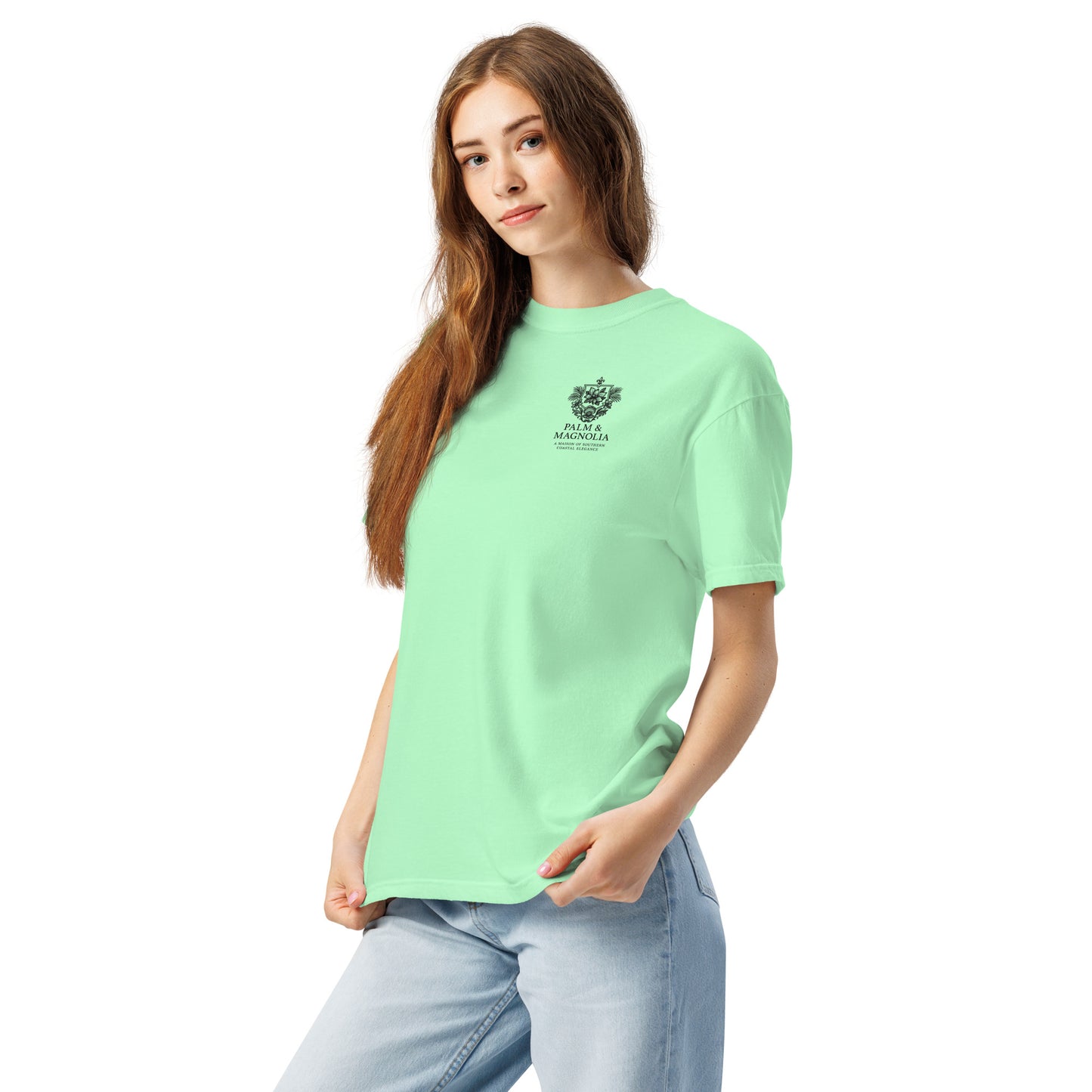 Woman modeling a light green relaxed-fit short-sleeve tee with Hard Rock Bronco design.