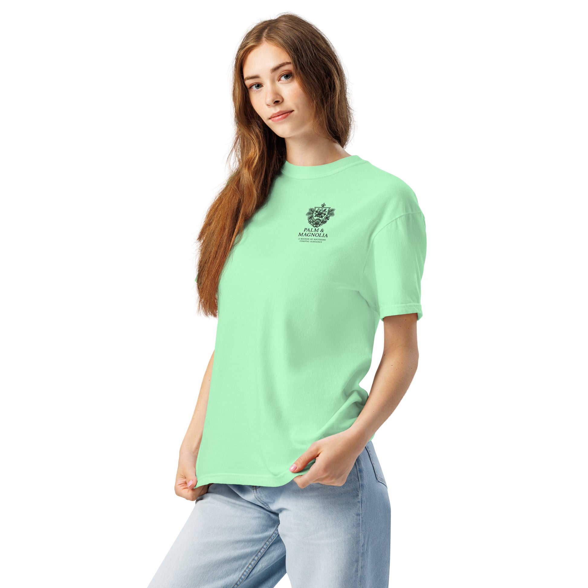 Woman modeling a light green relaxed-fit short-sleeve tee with Hard Rock Bronco design.