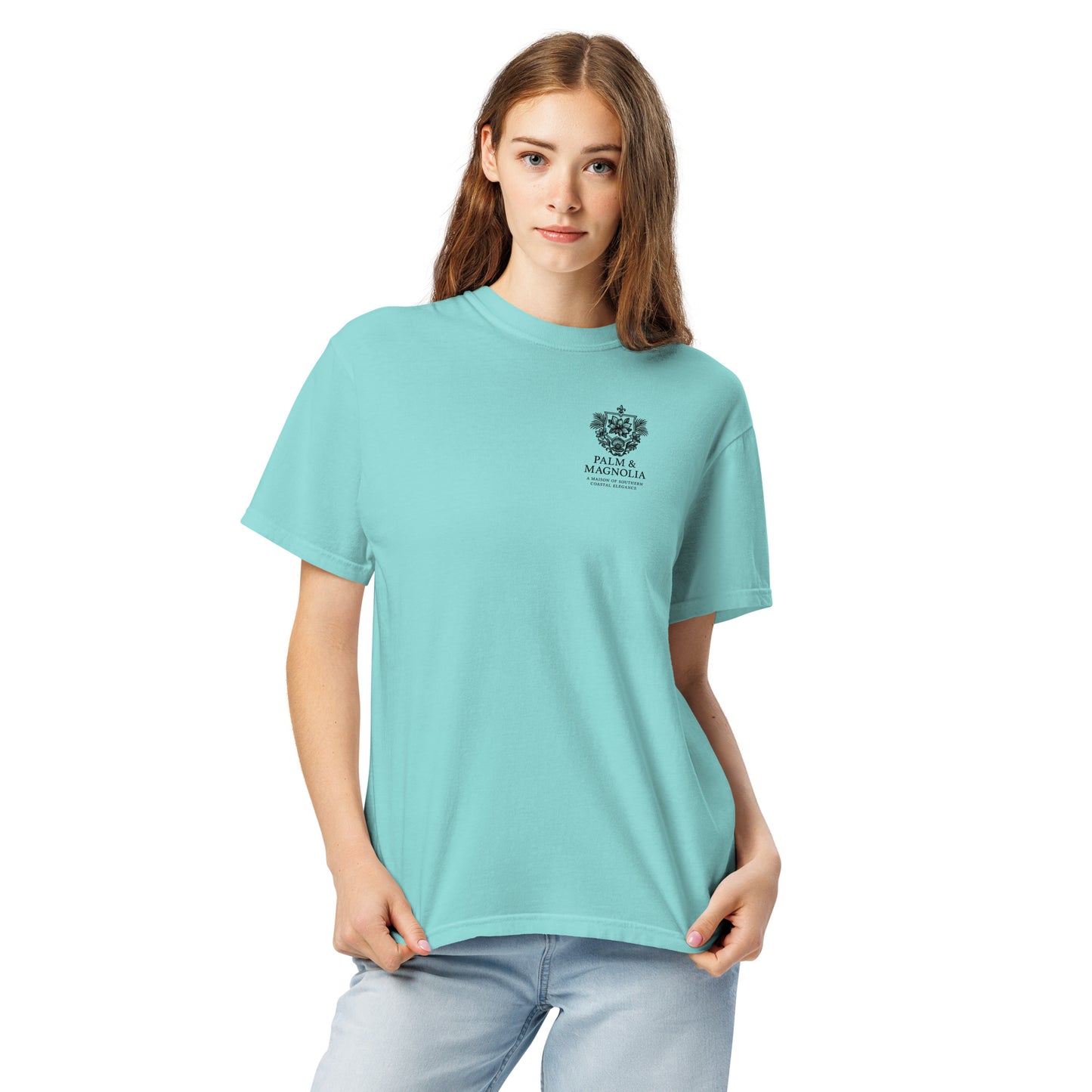 A woman models a relaxed-fit, light blue Comfort Colors T-shirt with a Hard Rock Bronco graphic.