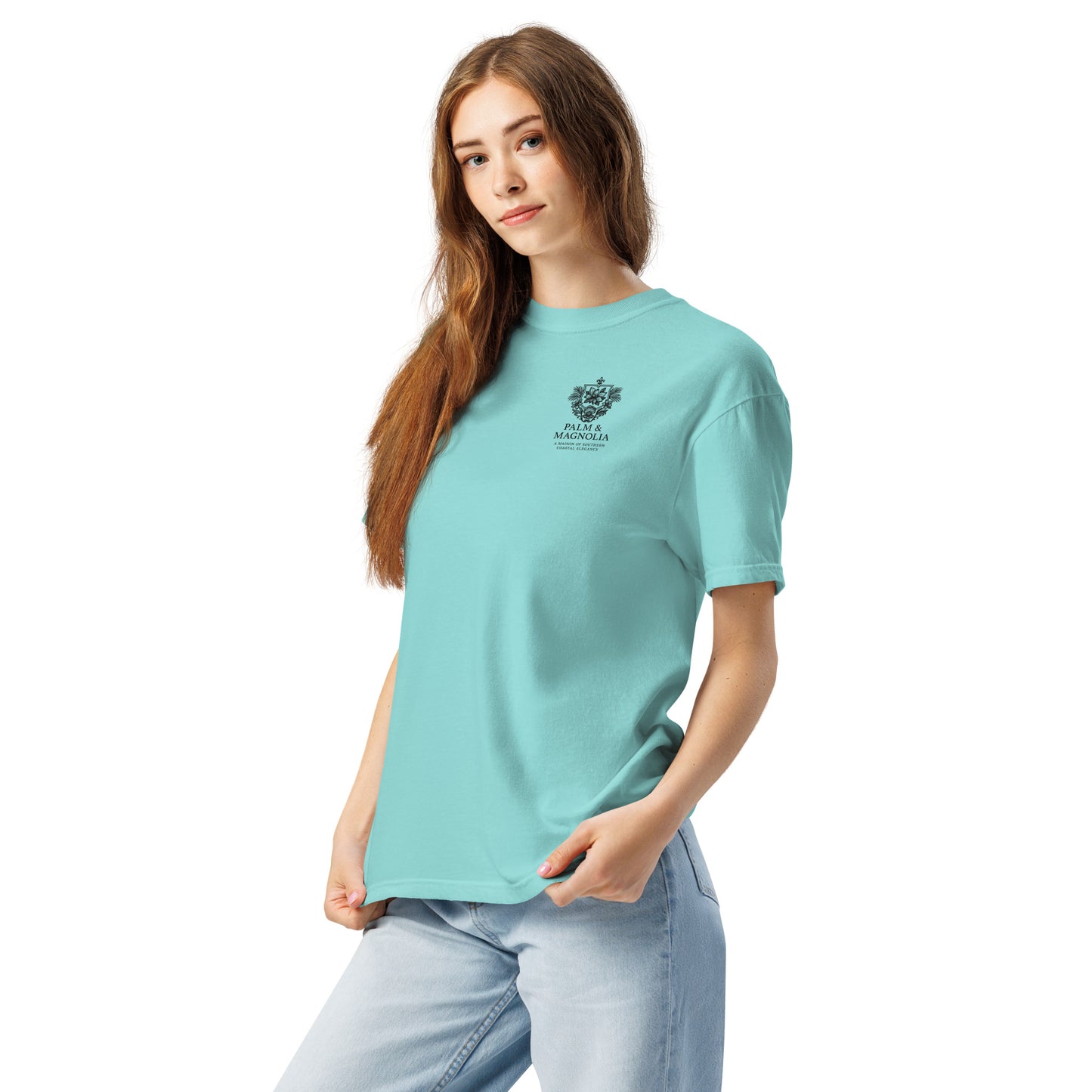 Woman modeling a light blue Comfort Colors tee with Coastal Companions Hard Rock Bronco graphic.