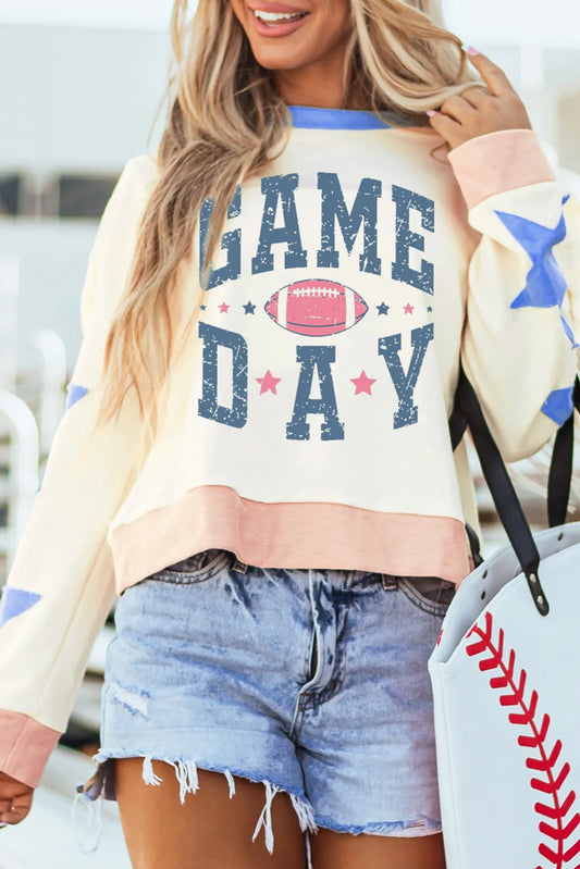 Gray sweatshirt with round neck and long sleeves featuring a star patch design.