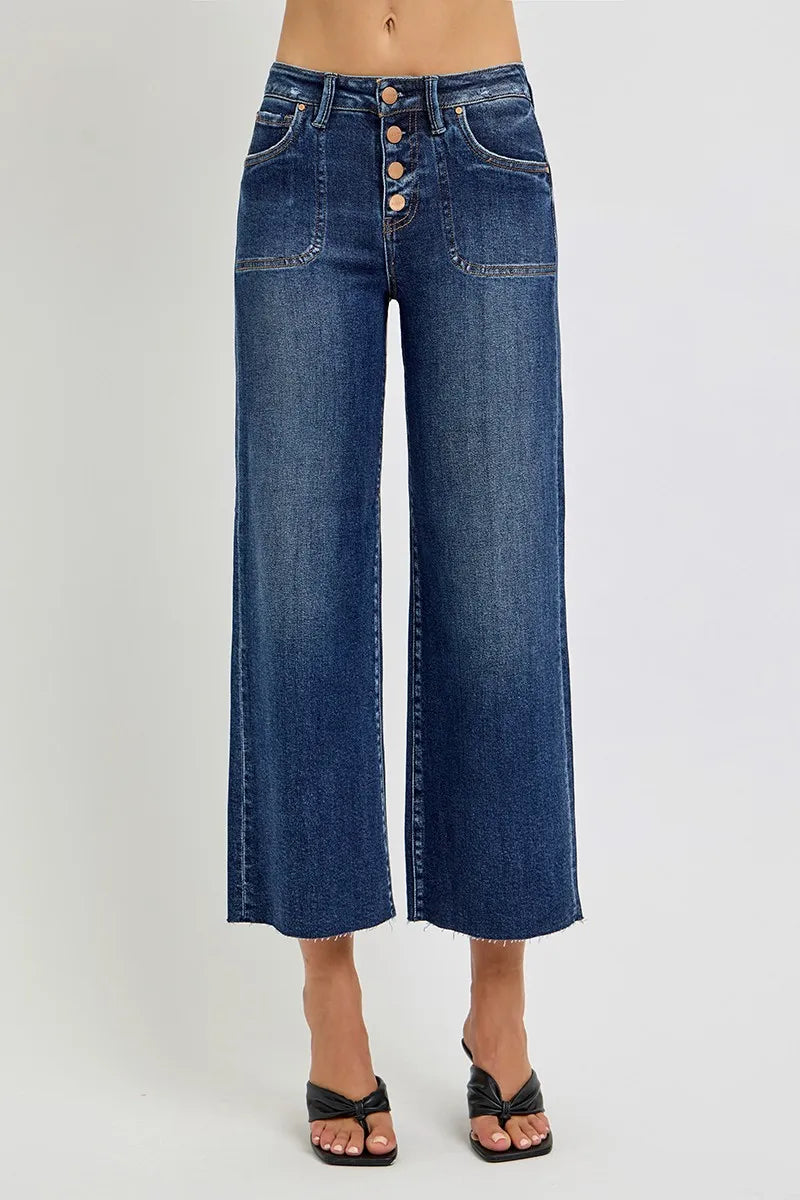 High-rise wide-leg crop jeans in medium wash with button fly and pockets.