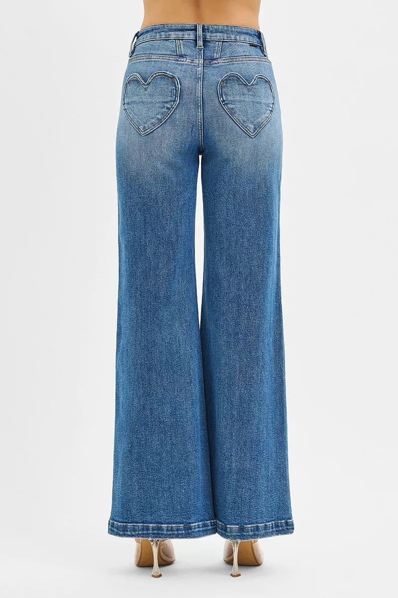 Rear view of high-rise wide-leg jeans with heart-shaped back pockets.