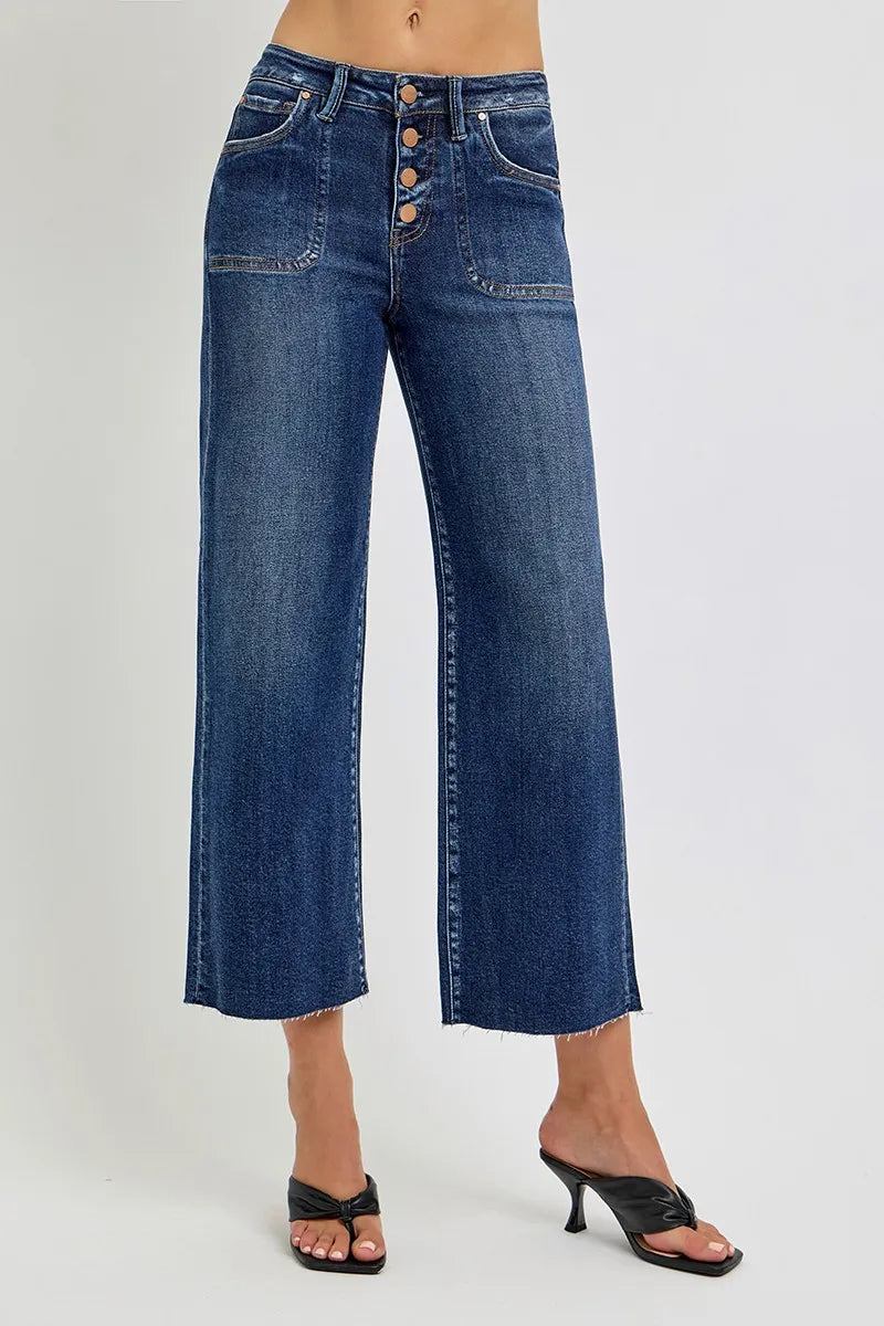 High-rise wide-leg crop jeans in medium wash with button front and pockets.