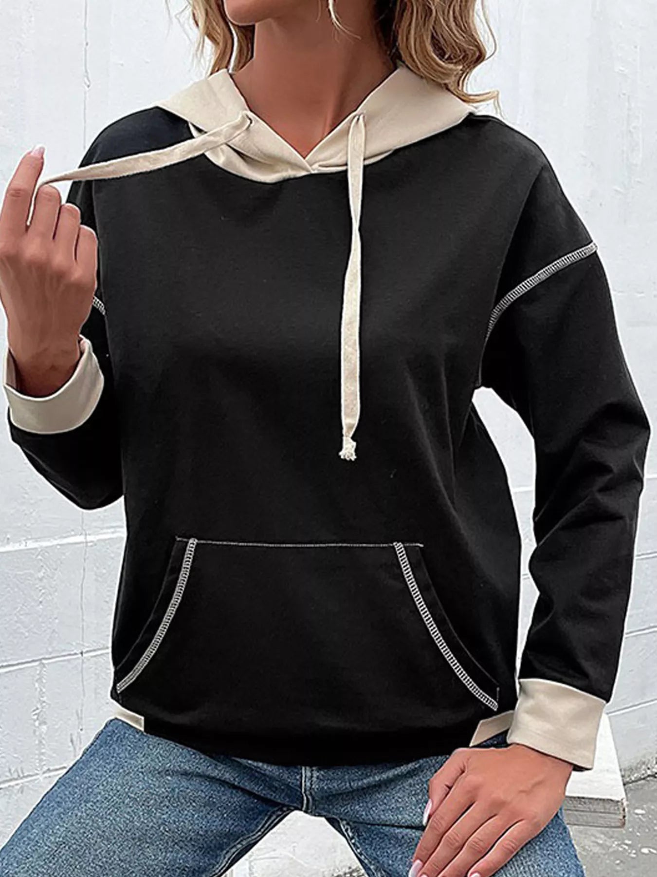 Color block hoodie with drawstring hood and kangaroo pocket in a soft polyester cotton blend.
