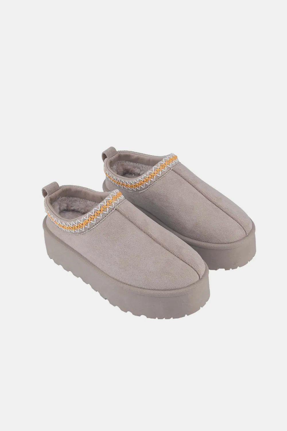 Gray Weeboo platform slip-on boots with embroidered trim.