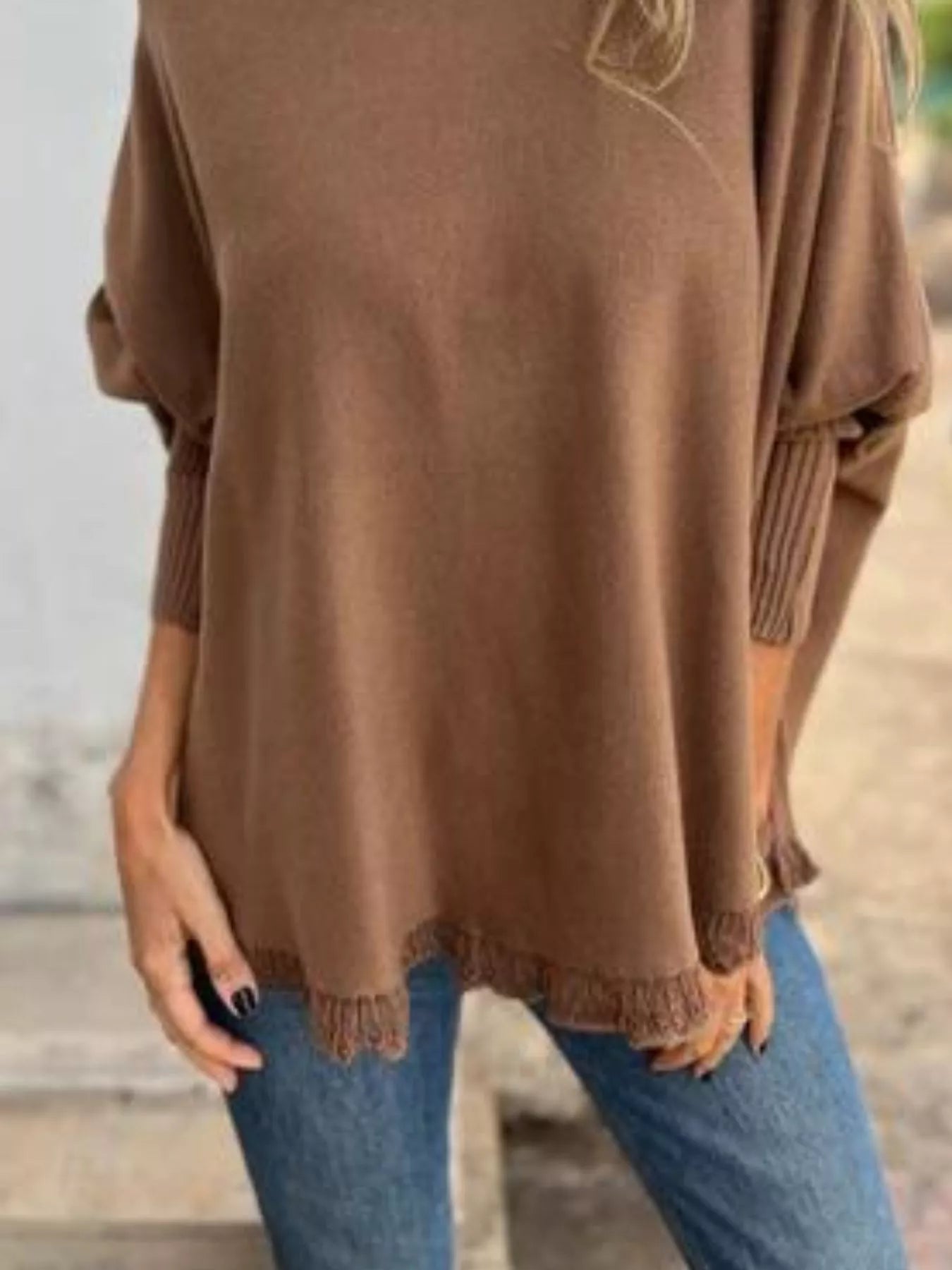 Plus size round neck long sleeve knit top with lace trim in soft polyester fabric.