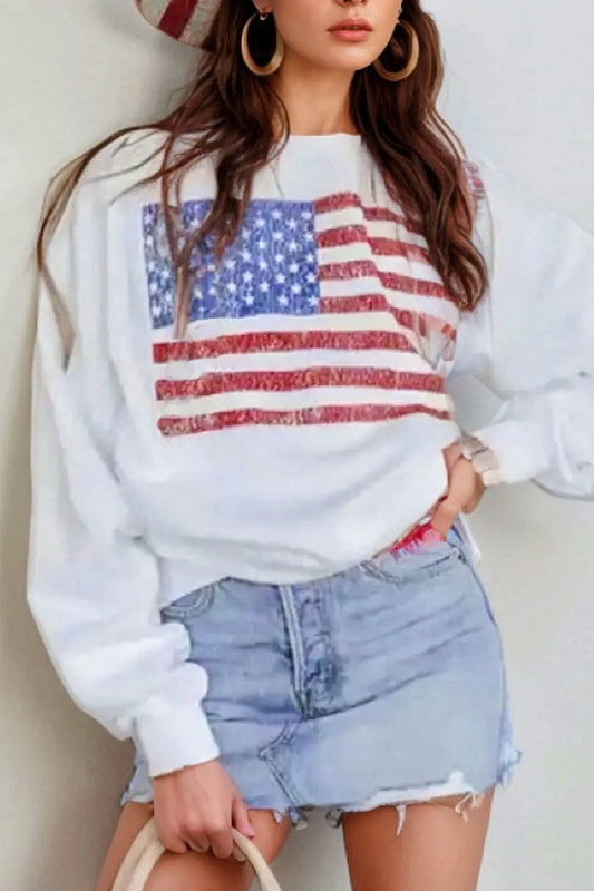 A long sleeve sweatshirt featuring a US flag design, round neck, and slightly stretchy fabric.