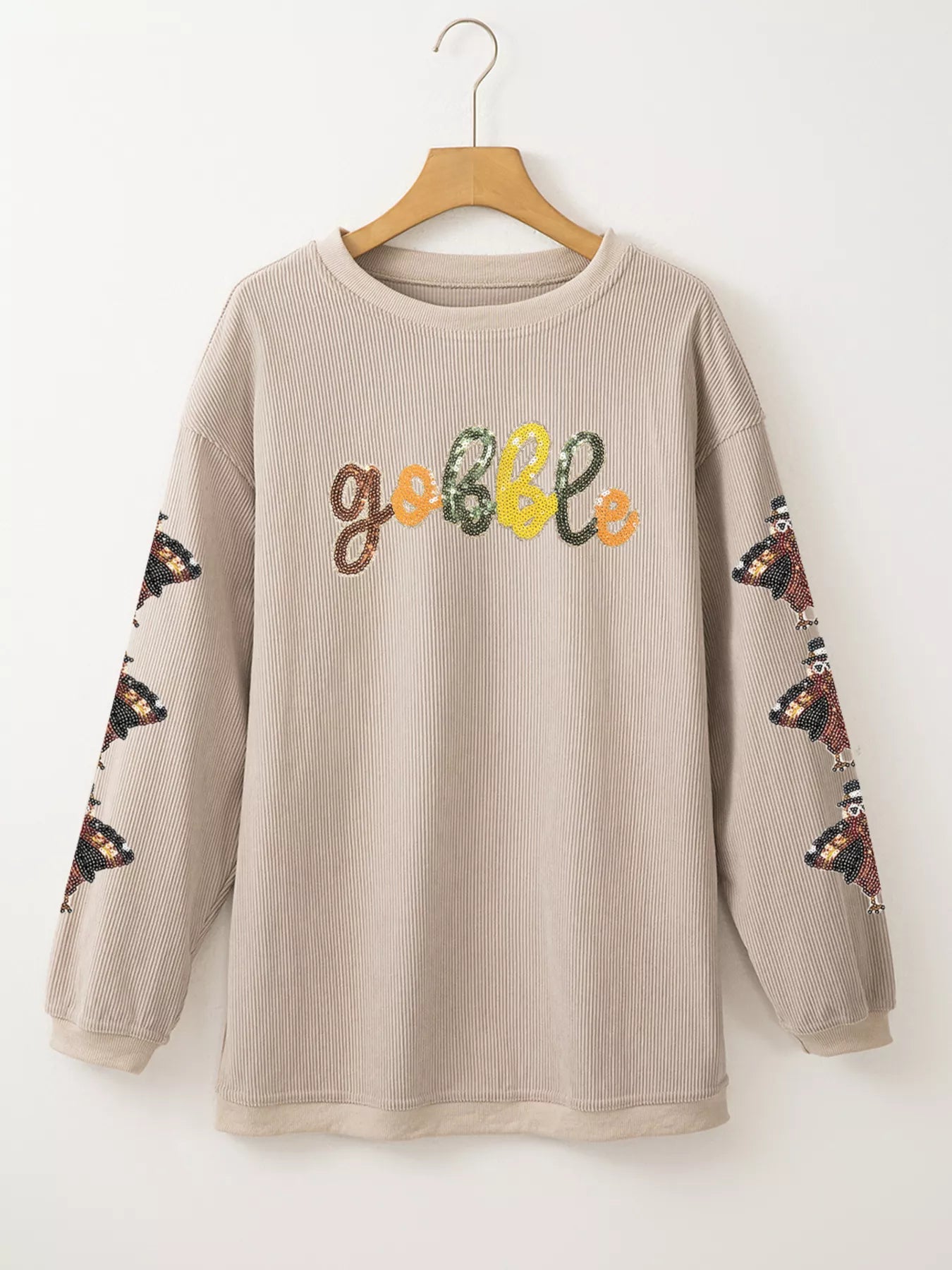 Gobble corded ribbed turkey sequin sweatshirt in beige with butterfly sleeves.