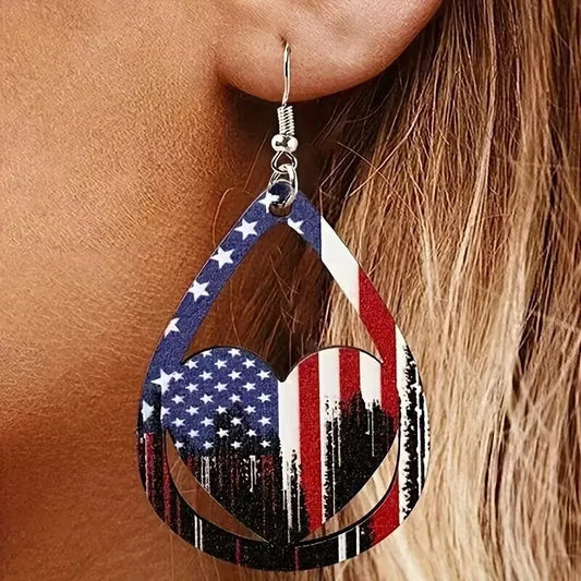 Pair of wooden earrings shaped like the US flag with alloy accents and a 3.9-inch length
