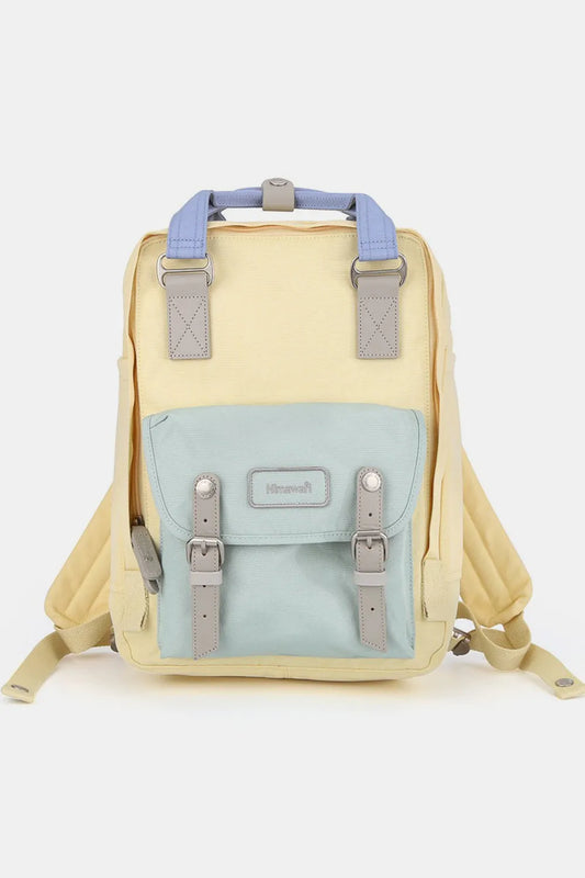 Yellow and blue Himawari water-resistant nylon backpack with contrast panels and padded straps.