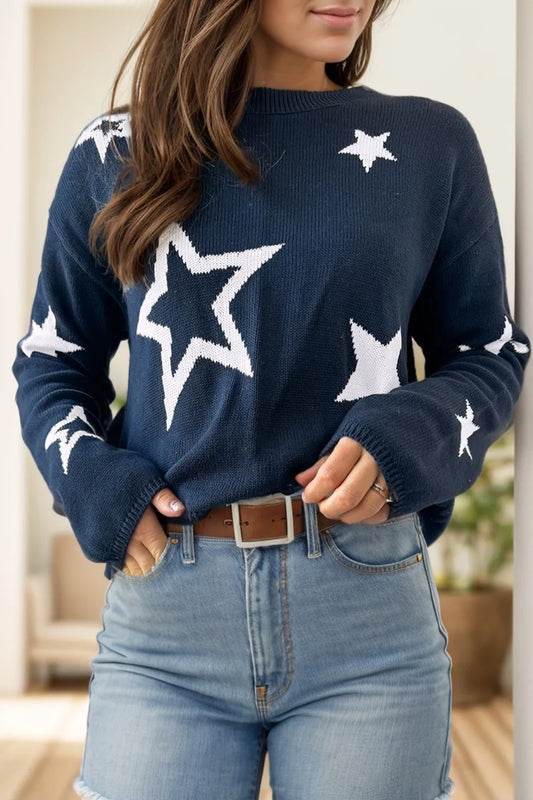 A soft cotton long sleeve sweater in a basic style with a relaxed fit.