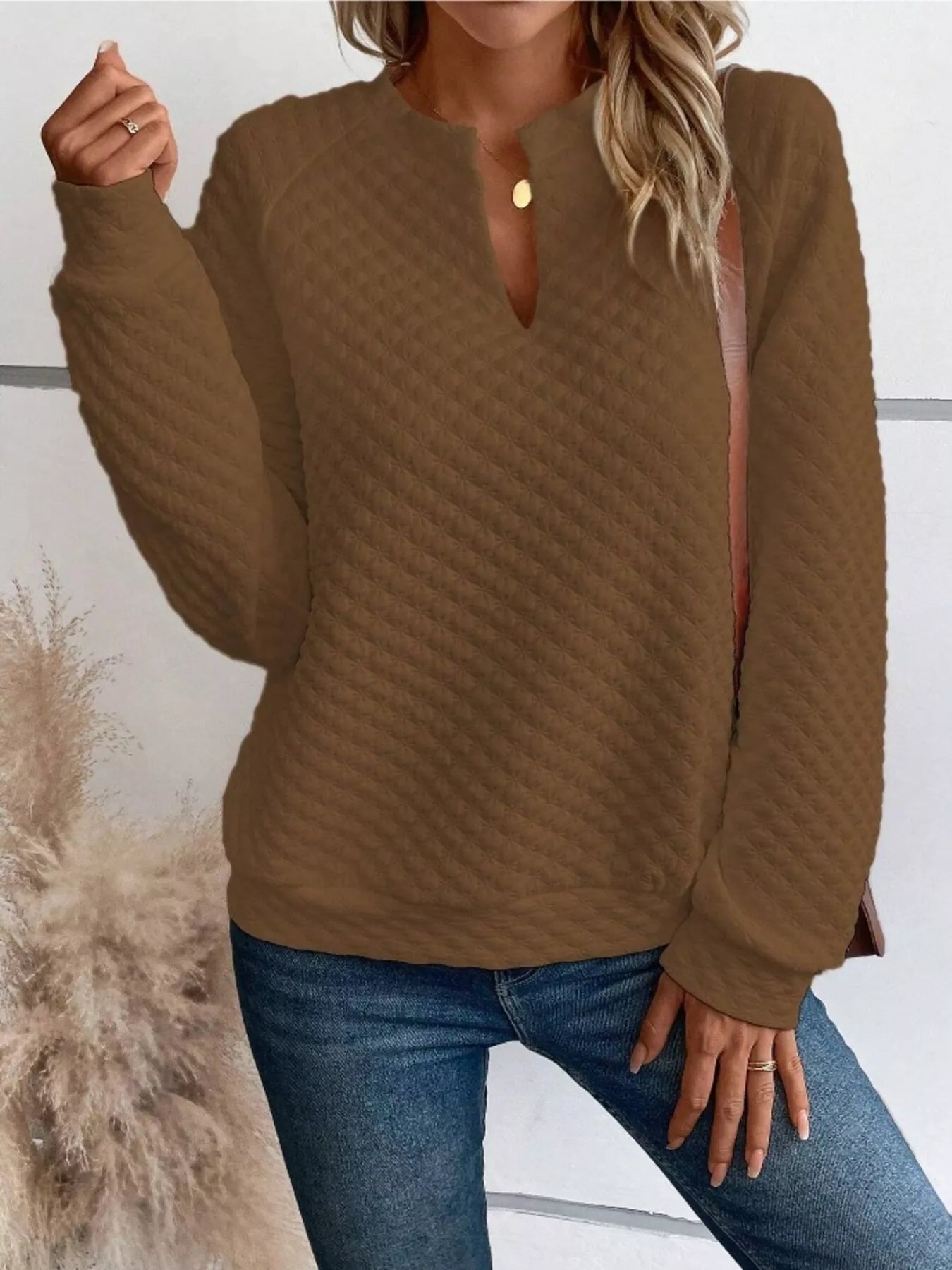 Textured sweatshirt with notched raglan sleeves in a basic style and no stretch fabric