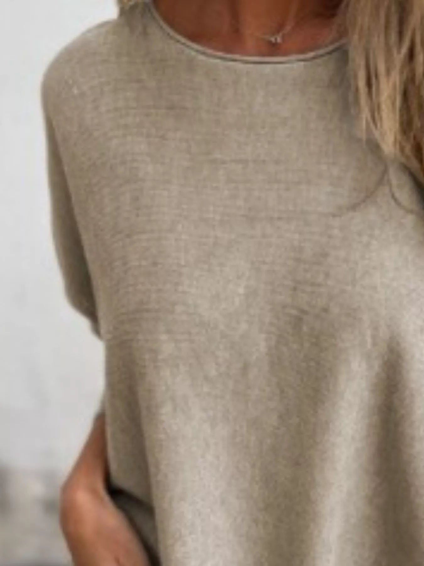 Plus size round neck long sleeve knit top with lace trim in soft polyester fabric.