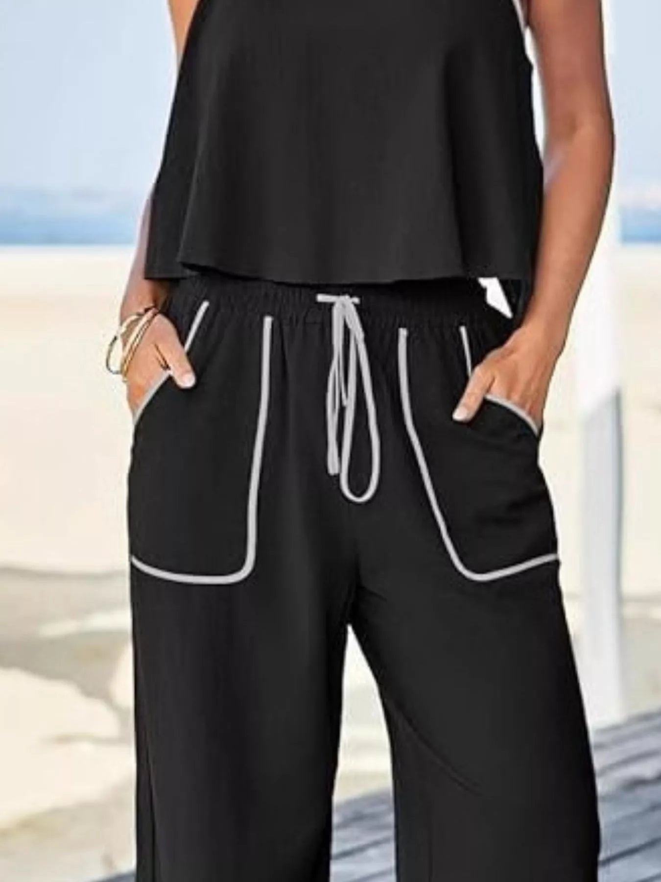 Two-piece polyester spandex tank top and pants set with contrast trim and drawstring waist