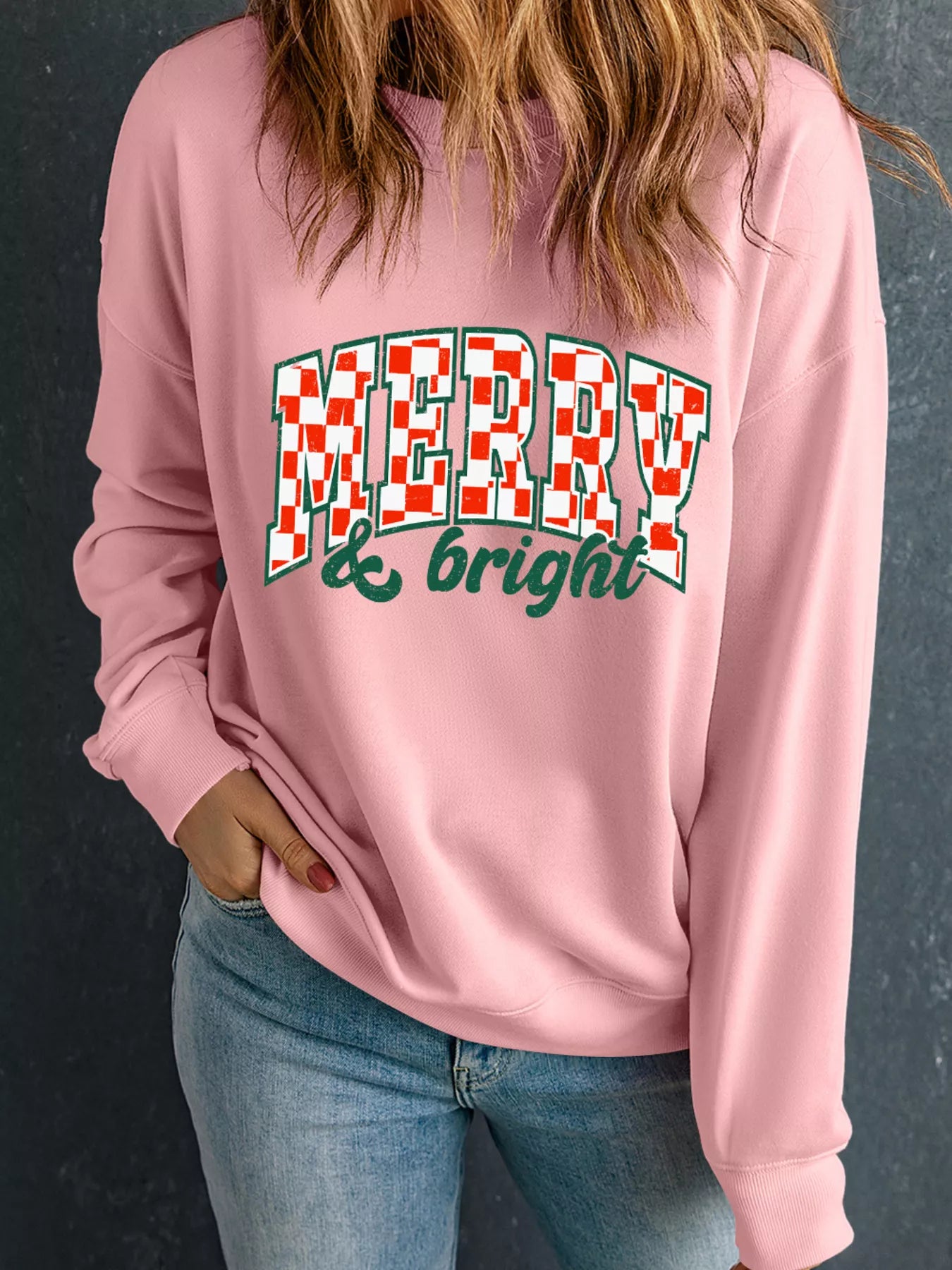 Lightweight cotton blend sweatshirt with a Christmas graphic and long sleeves.